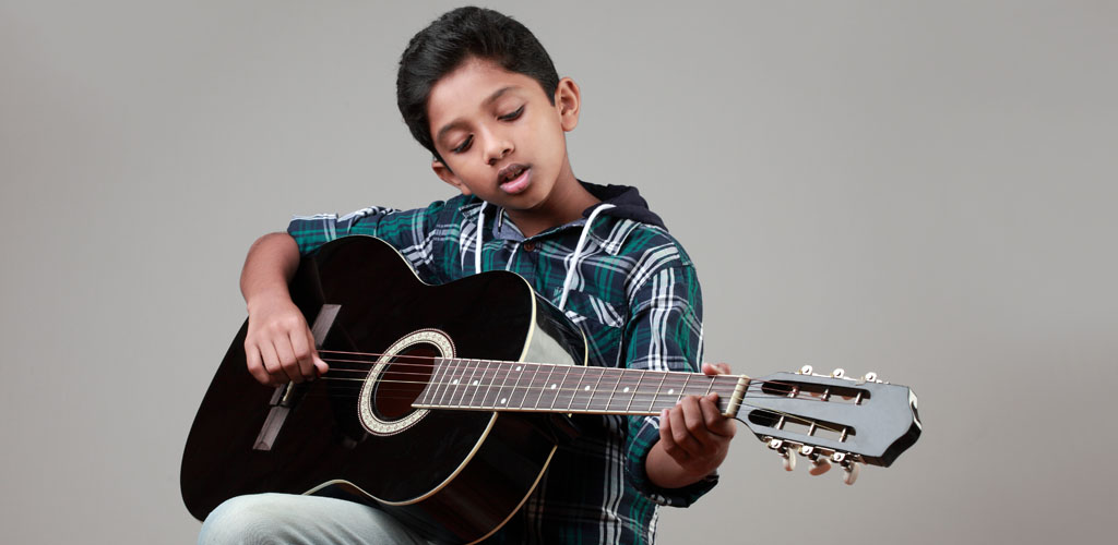 Boy Playing Guitar