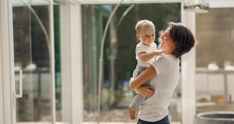 a mother talking to her baby