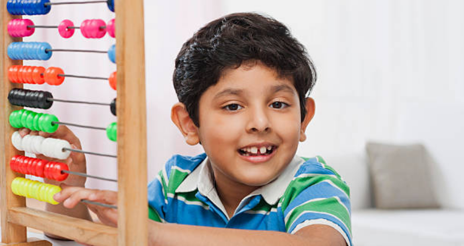 a child learning the Benefits of Abacus