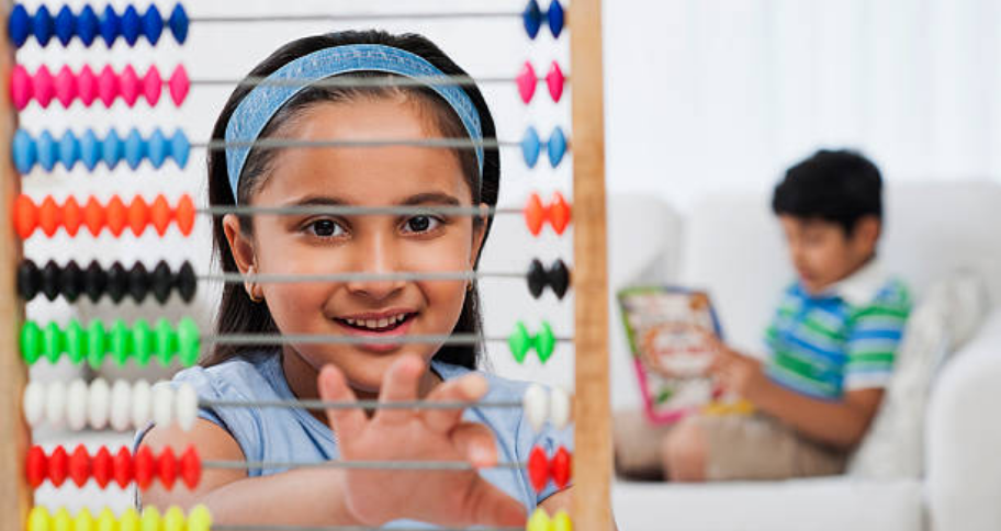 a child learning Benefits of Abacus