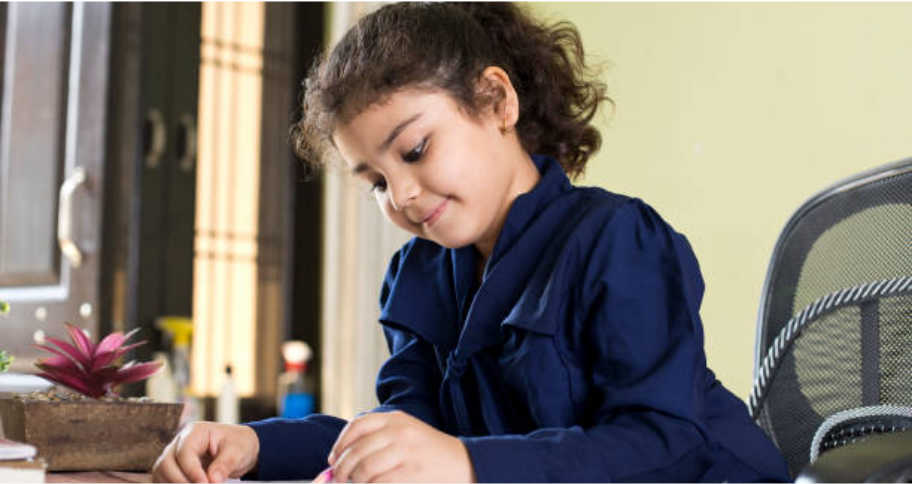 a child studying alone