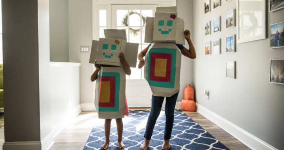 a  mother and child make costumes