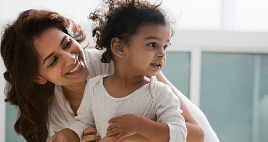 a mother playing with child