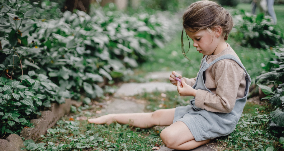 a child busy in her creative world