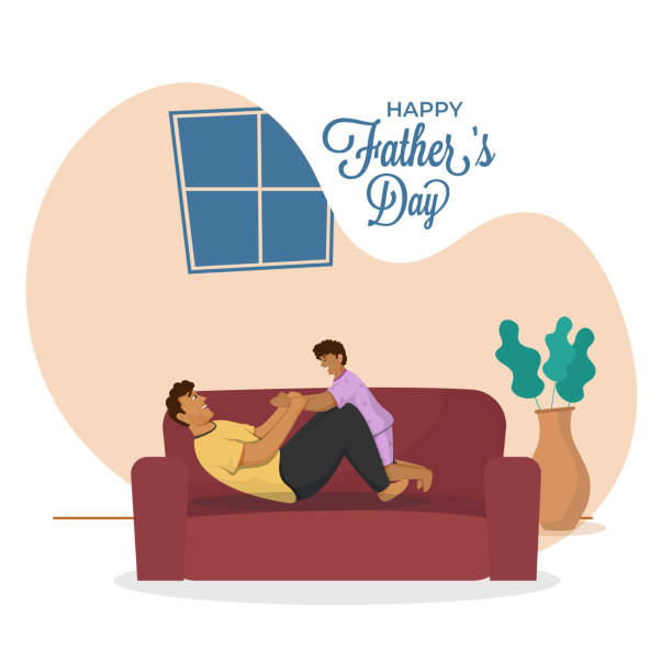 Cheerful Young Man Playing With His Son On Sofa For Happy Father's Day Concept.