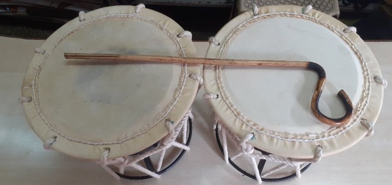 Close-up of a Sambal drum, a traditional percussion instrument with a cylindrical shape and wooden frame