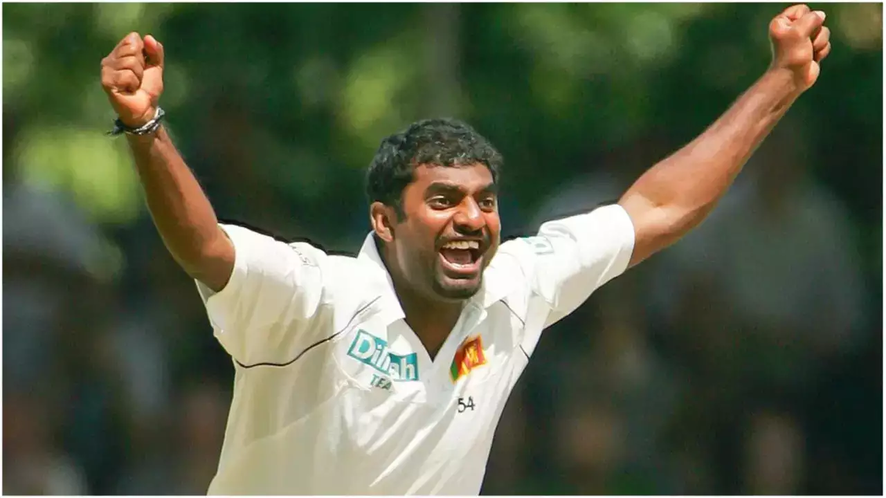 Muttiah Muralitharan delivering a ball, holding the record for the most wickets in Test cricket at 800