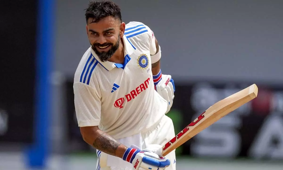 Virat Kohli celebrating a century during a Test match, symbolizing his status as one of the modern greats in cricket with over 8,000 Test runs