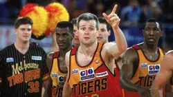 Melbourne Tigers basketball team of 12 players in full uniform during an NBL event, representing Australian basketball excellence.