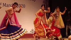 College students performing Kajari Dance