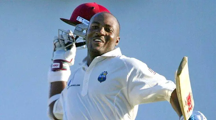 Brian Lara raising his bat after his historic unbeaten 400-run innings in Test cricket, the highest individual score in the format.