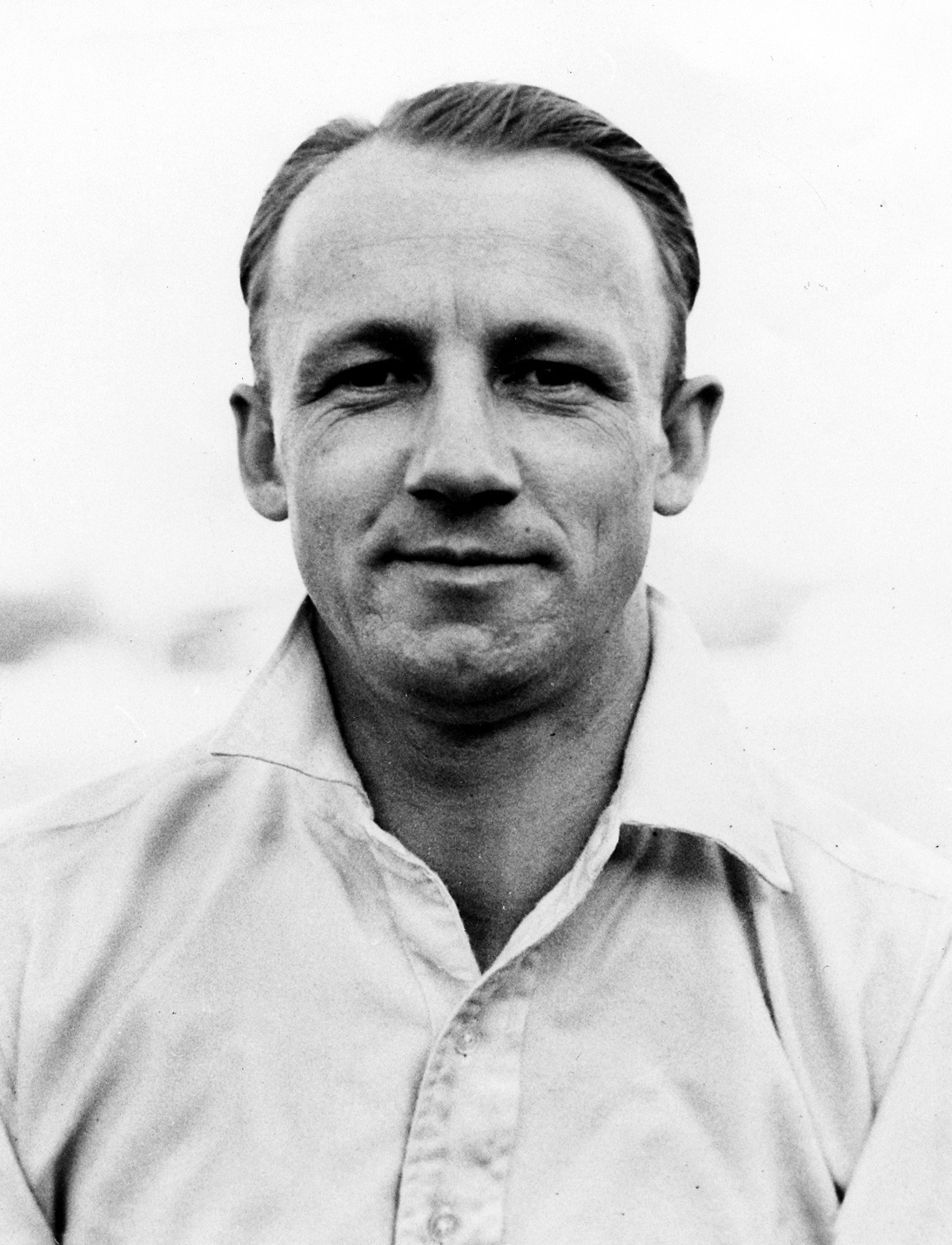 Iconic photograph of Sir Donald Bradman, the greatest batsman in cricket history, with a record batting average of 99.94.