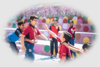 Indian primary school students playing in a playground