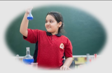 Indian primary school students conducting a science experiment