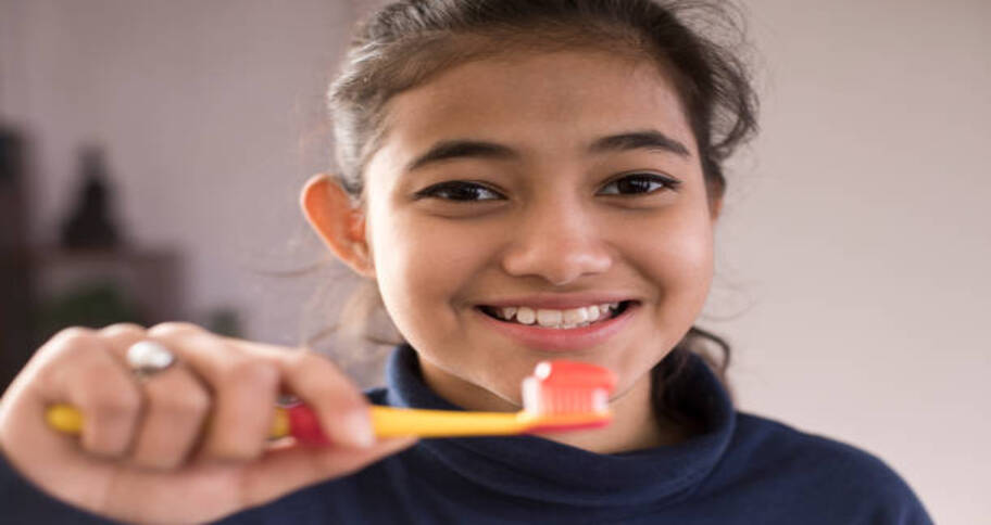 brushing tooth following the hygiene 