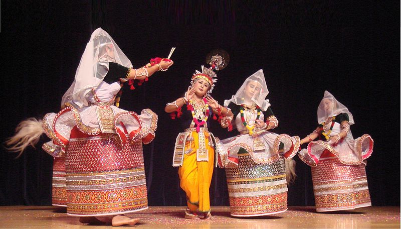 A colorful performance of Raslila, featuring dancers in traditional attire reenacting scenes from Lord Krishna's.