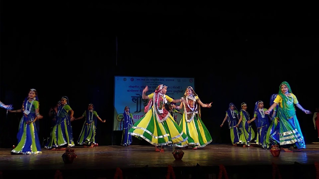 A picturesque scene of women in traditional attire